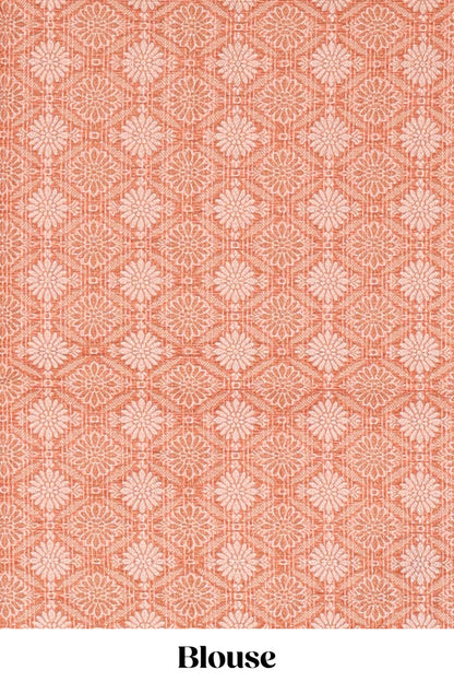 Orange checked kota cotton saree with contrast border and floral design blouse