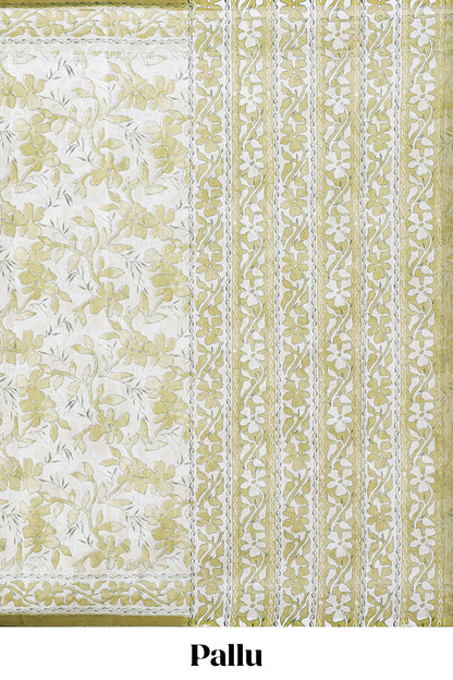Cream floral design kota cotton saree with self border and matching print blouse