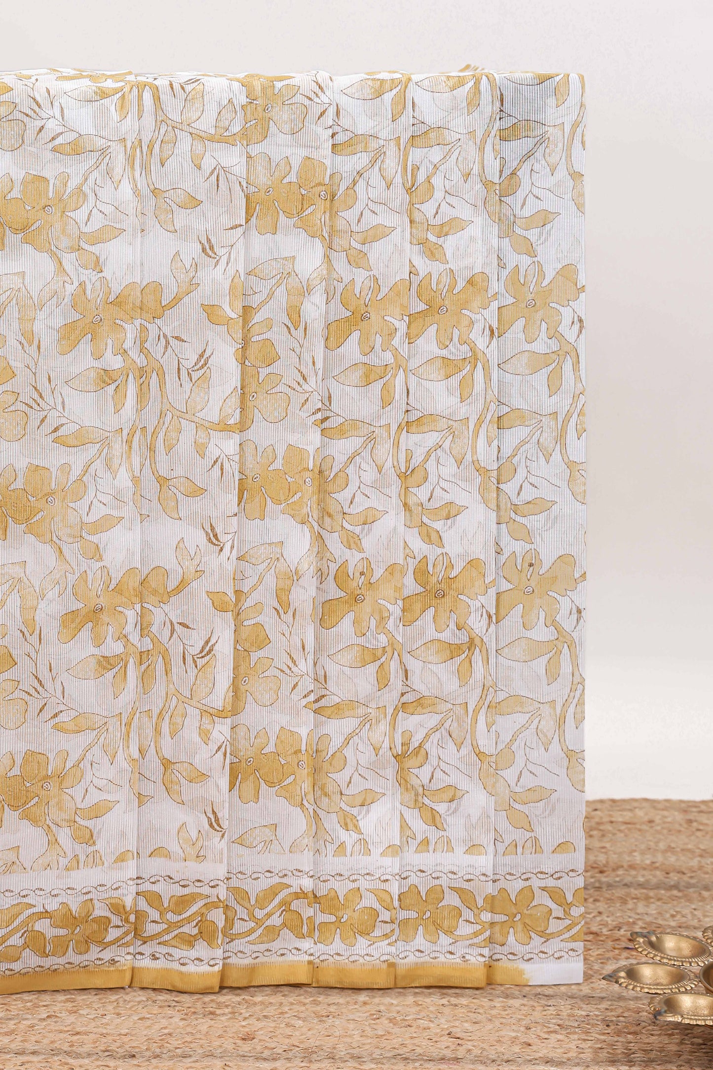 Cream floral design kota cotton saree with self border and matching floral print blouse