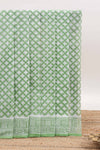 Green floral design kota cotton saree with self border and contrast floral print blouse