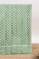 Green floral design kota cotton saree with self border and contrast floral print blouse