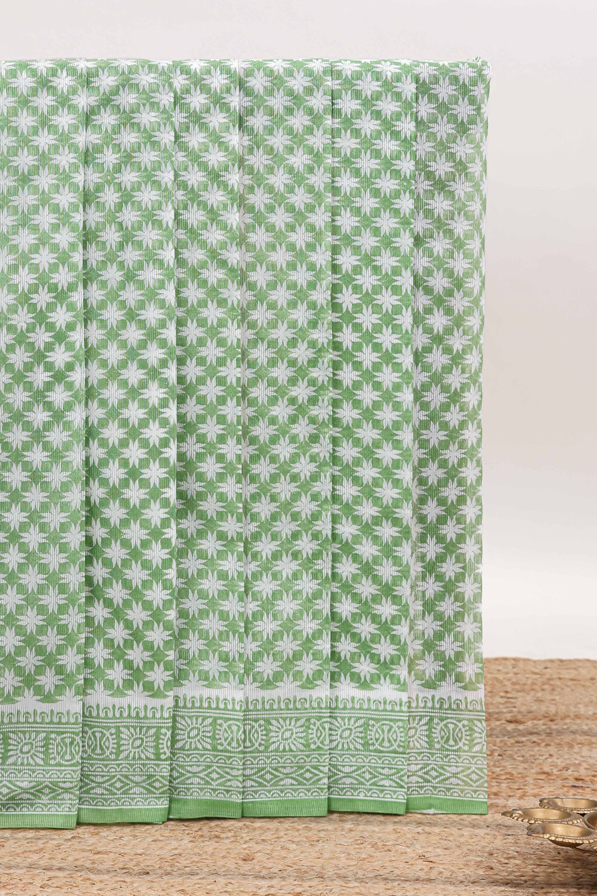 Green floral design kota cotton saree with self border and contrast floral print blouse