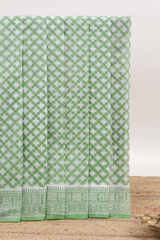 Green floral design kota cotton saree with self border and contrast floral print blouse