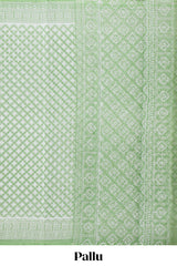 Green floral design kota cotton saree with self border and contrast floral print blouse