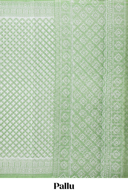 Green floral design kota cotton saree with self border and contrast floral print blouse
