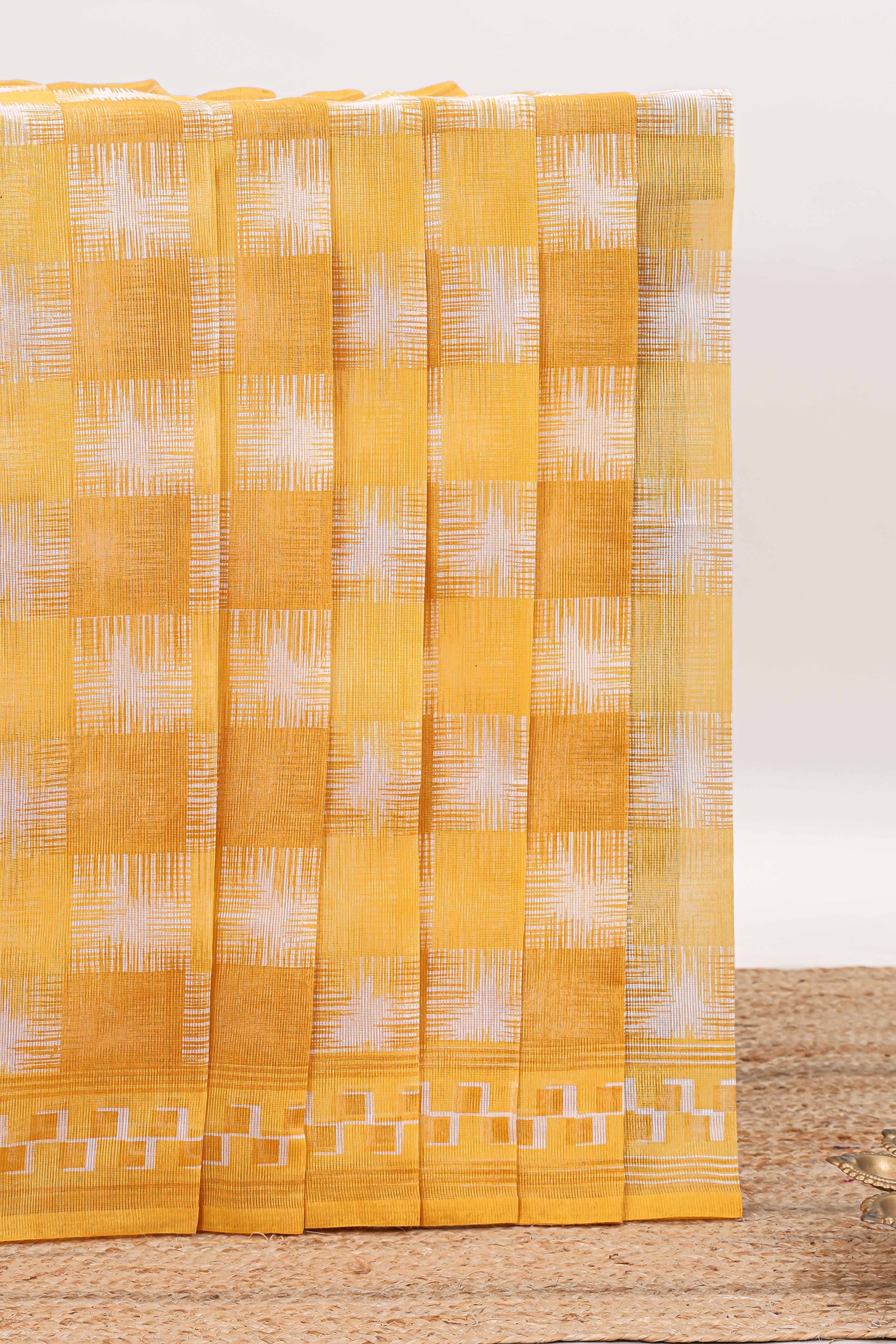Yellow checked design kota cotton saree with self border and contrast floral print blouse