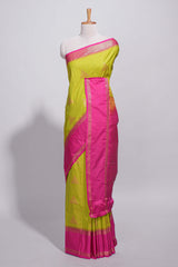 Green color kotta cotton saree with copper zari floral buttas a rich zari border and woven zari pallu with matching blouse piece