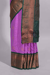 Purple colour kotta cotton saree with copper zari floral buttas a rich zari border and woven zari pallu with matching blouse piece
