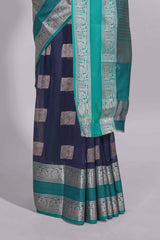 Navy blue tussar saree with silver zari square buttas retta petta zari border and woven zari pallu with contrast blouse piece