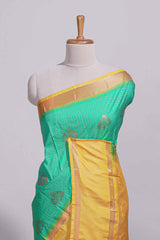 Rama green kotta cotton saree with zari floral buttas a rich zari border and woven zari pallu with matching blouse piece