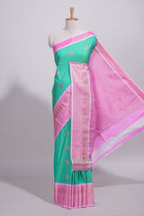 Aqua green kotta cotton saree with zari floral buttas a rich zari border and woven zari pallu with matching blouse piece