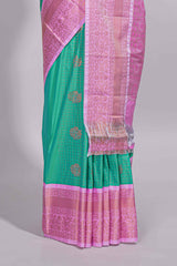 Aqua green kotta cotton saree with zari floral buttas a rich zari border and woven zari pallu with matching blouse piece