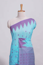 Sky blue Kotta cotton saree with woven buttas contrasting purple Ikat-inspired border and a geometric woven pallu with matching blouse
