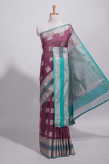 Violet color tussar saree with silver zari square buttas retta petta zari border and woven zari pallu with contrast blouse piece
