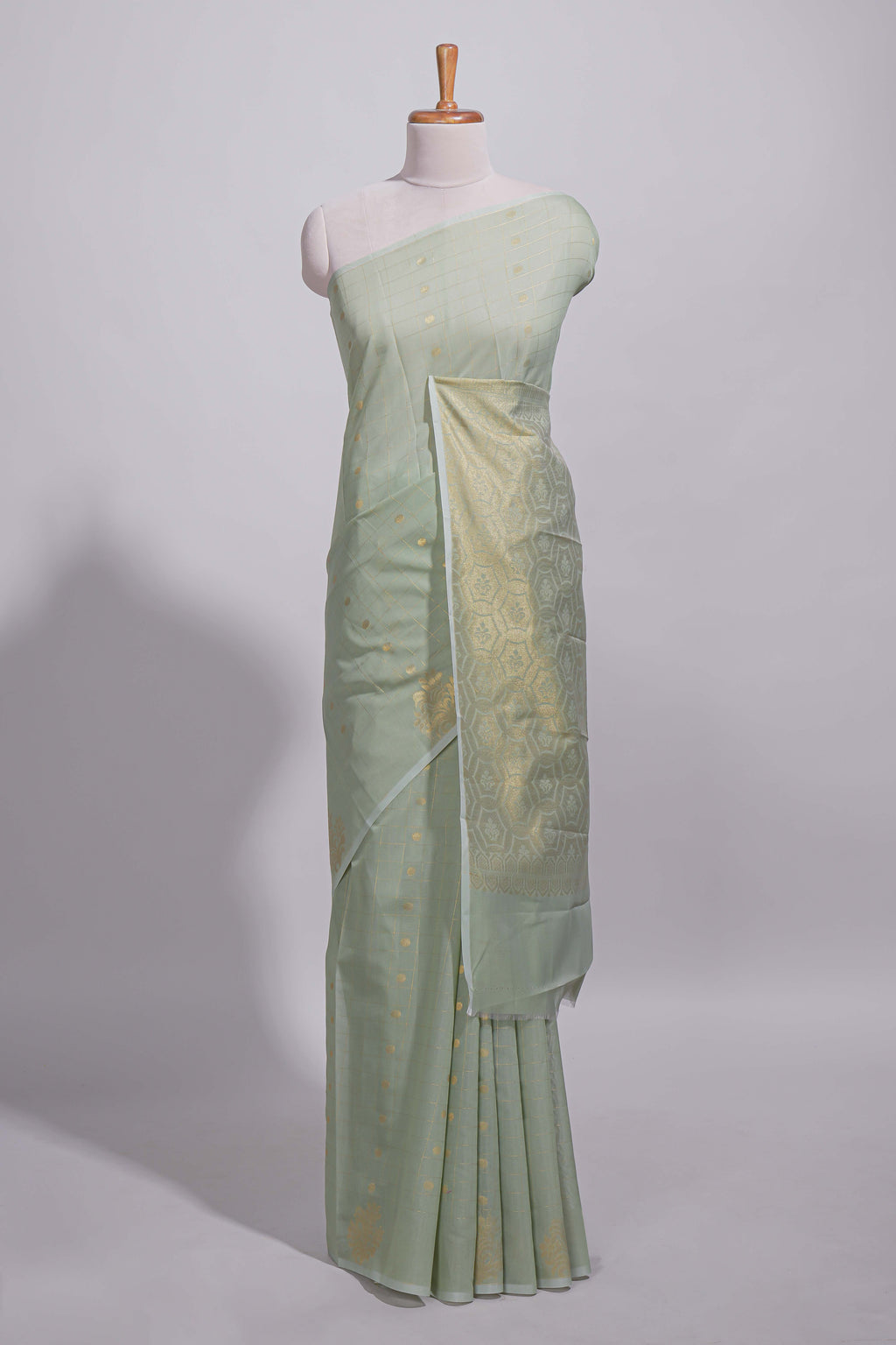 Pastel green Kotta saree with gold woven checks and butta  with rich gold zari woven pallu with matching blouse