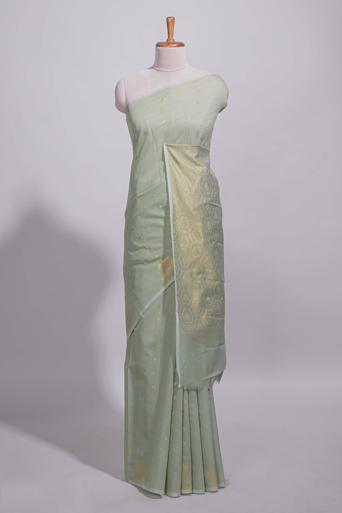 Pastel green Kotta saree with gold woven checks and butta  with rich gold zari woven pallu with matching blouse