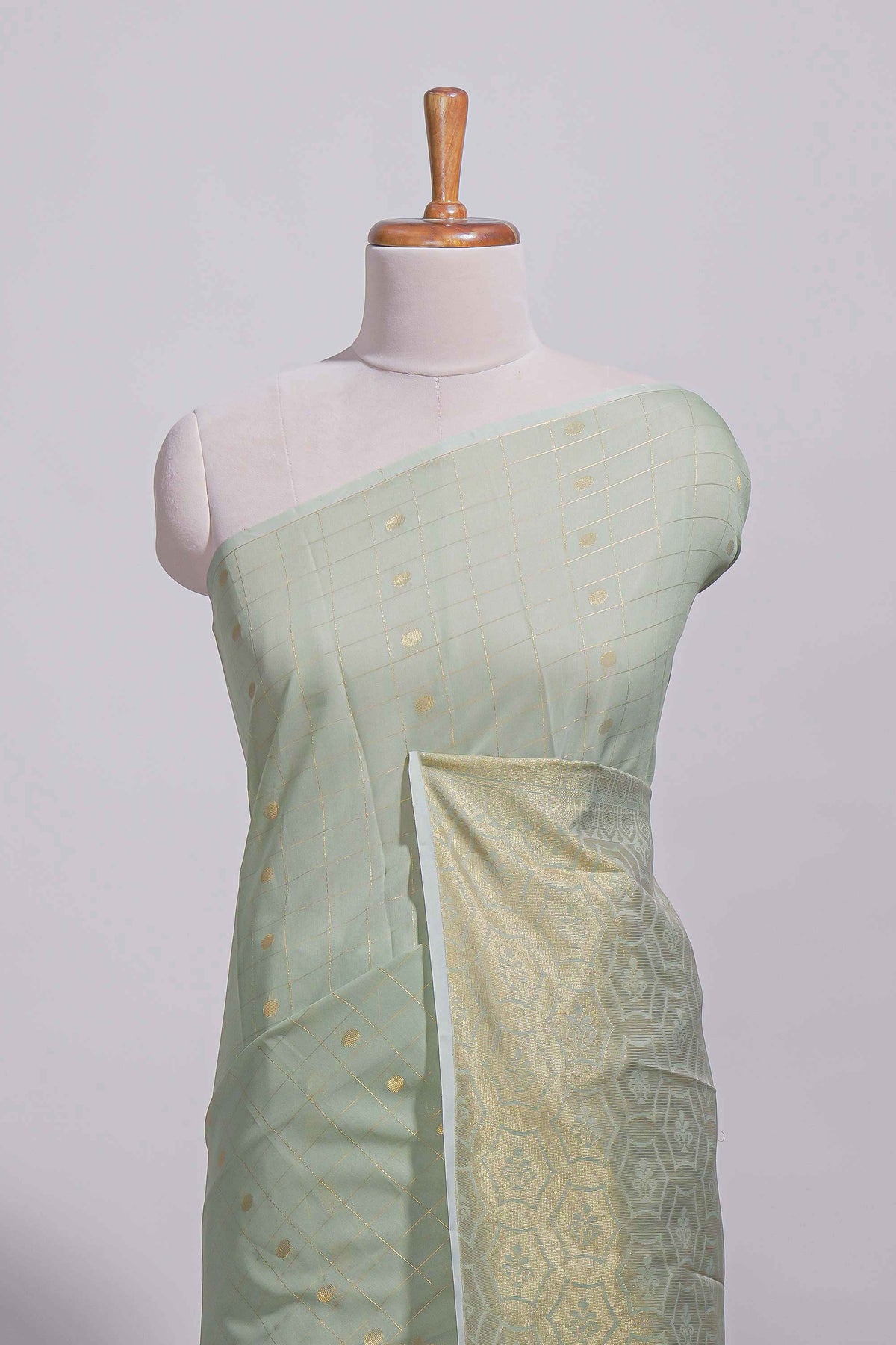 Pastel green Kotta saree with gold woven checks and butta  with rich gold zari woven pallu with matching blouse
