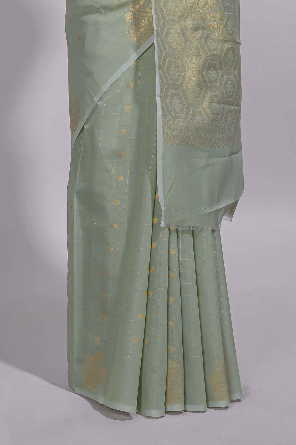 Pastel green Kotta saree with gold woven checks and butta  with rich gold zari woven pallu with matching blouse