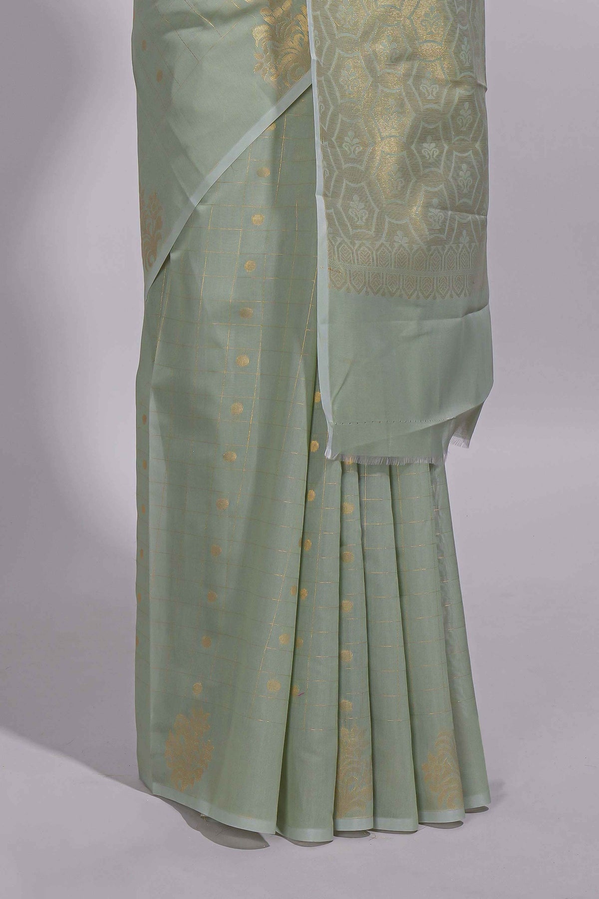 Pastel green Kotta saree with gold woven checks and butta  with rich gold zari woven pallu with matching blouse