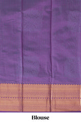 Blue tussar saree with gold zari floral buttas teal zari border and woven zari pallu with contrast blouse piece