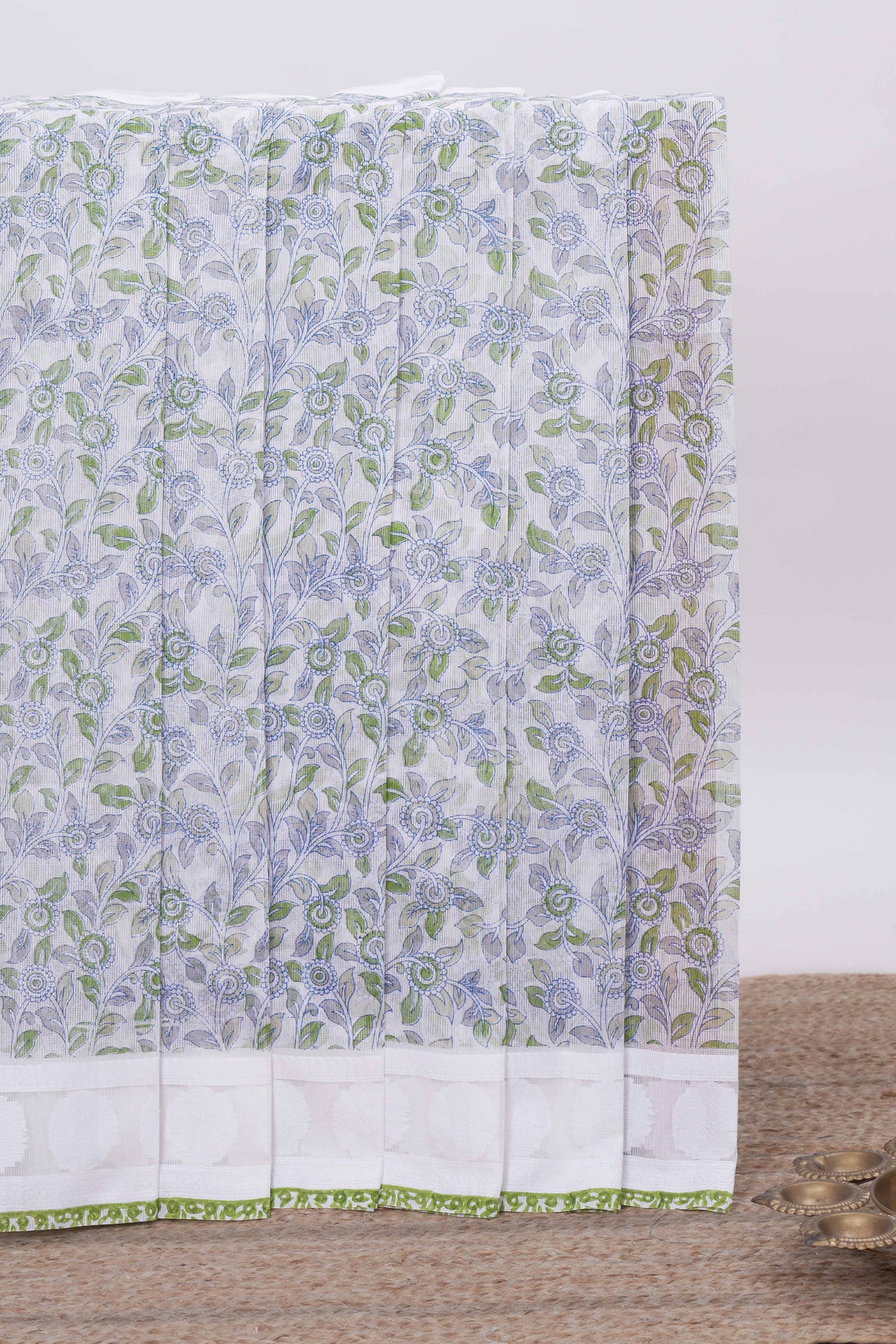 Off white floral design kota cotton saree with self border and matching motifs blouse