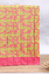 Green checked floral design kota cotton saree with contrast border and striped blouse