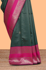 Green striped zari motifs design kota cotton saree with contrast zari border and motifs blouse