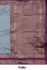 Light blue striped zari motifs design kota cotton saree with contrast zari border and motifs blouse