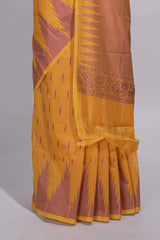Yellow kota cotton saree with gold zari buttas a zari border with temple design and zari woven pallu with matching blouse piece