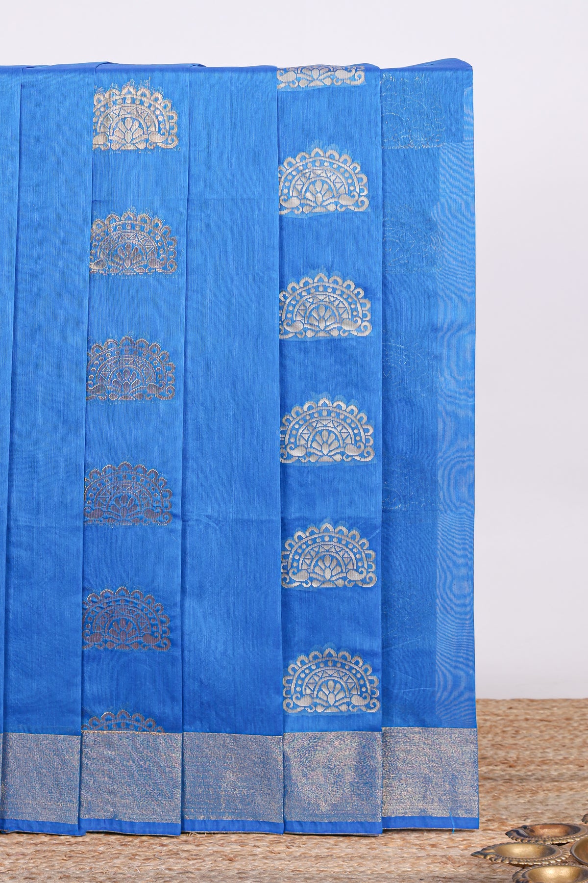 Blue butta zari motifs design kota cotton saree with self zari border and contrast blouse