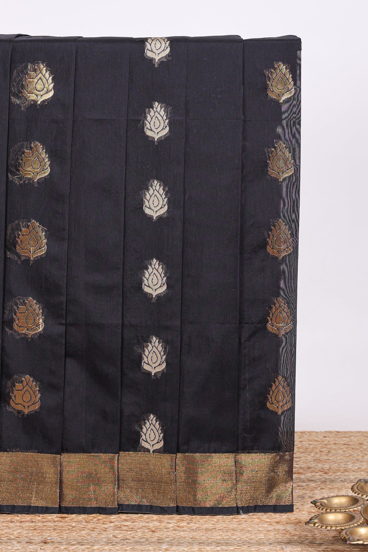 Black floral zari motifs kota cotton saree with self zari border and contrast blouse
