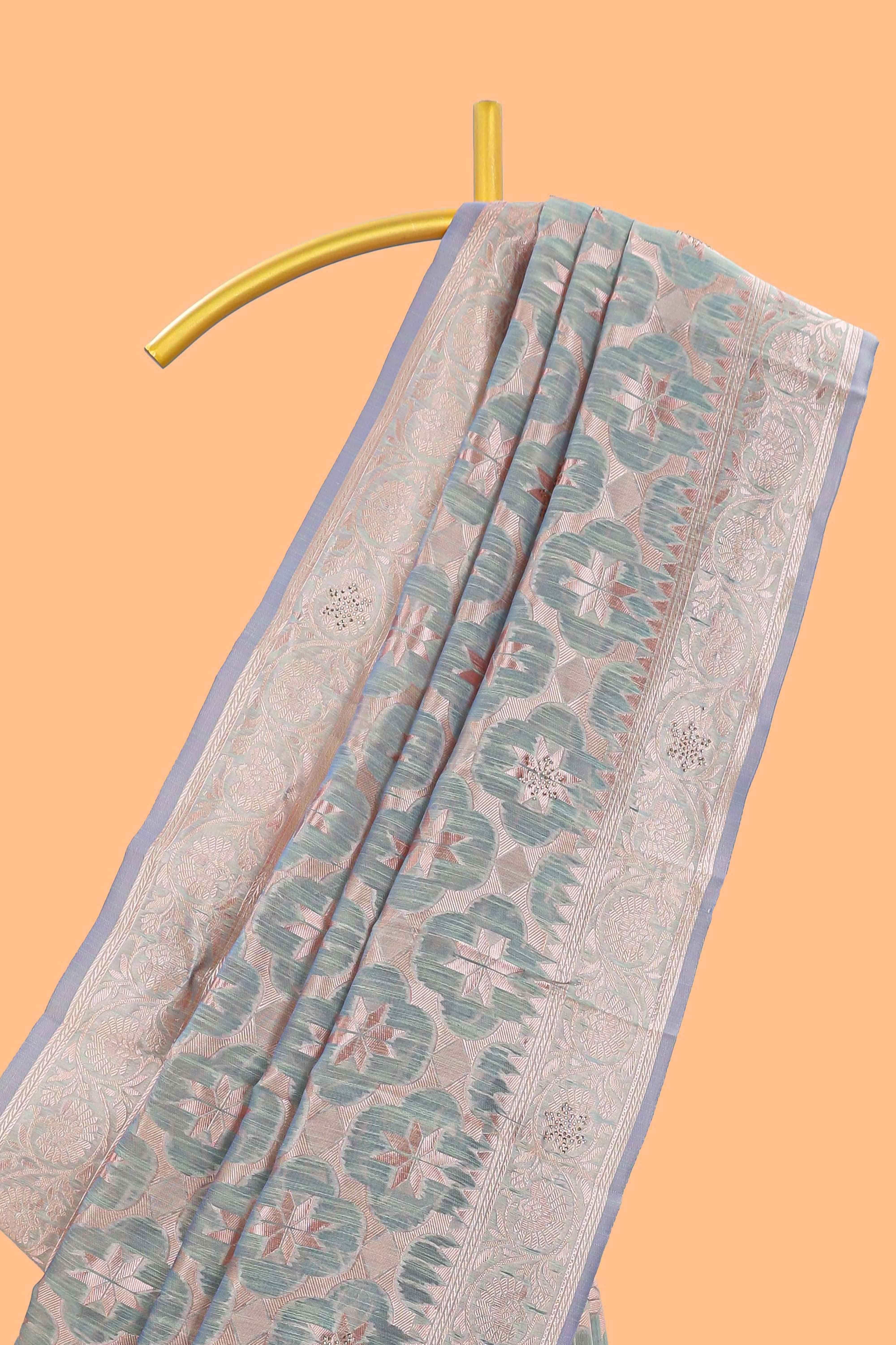 Powder green floral motifs design kota cotton saree with self zari border and contrast blouse