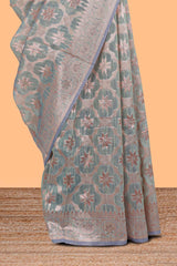 Powder green floral motifs design kota cotton saree with self zari border and contrast blouse