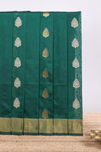 Green floral zari motifs kota cotton saree with self zari border and contrast blouse