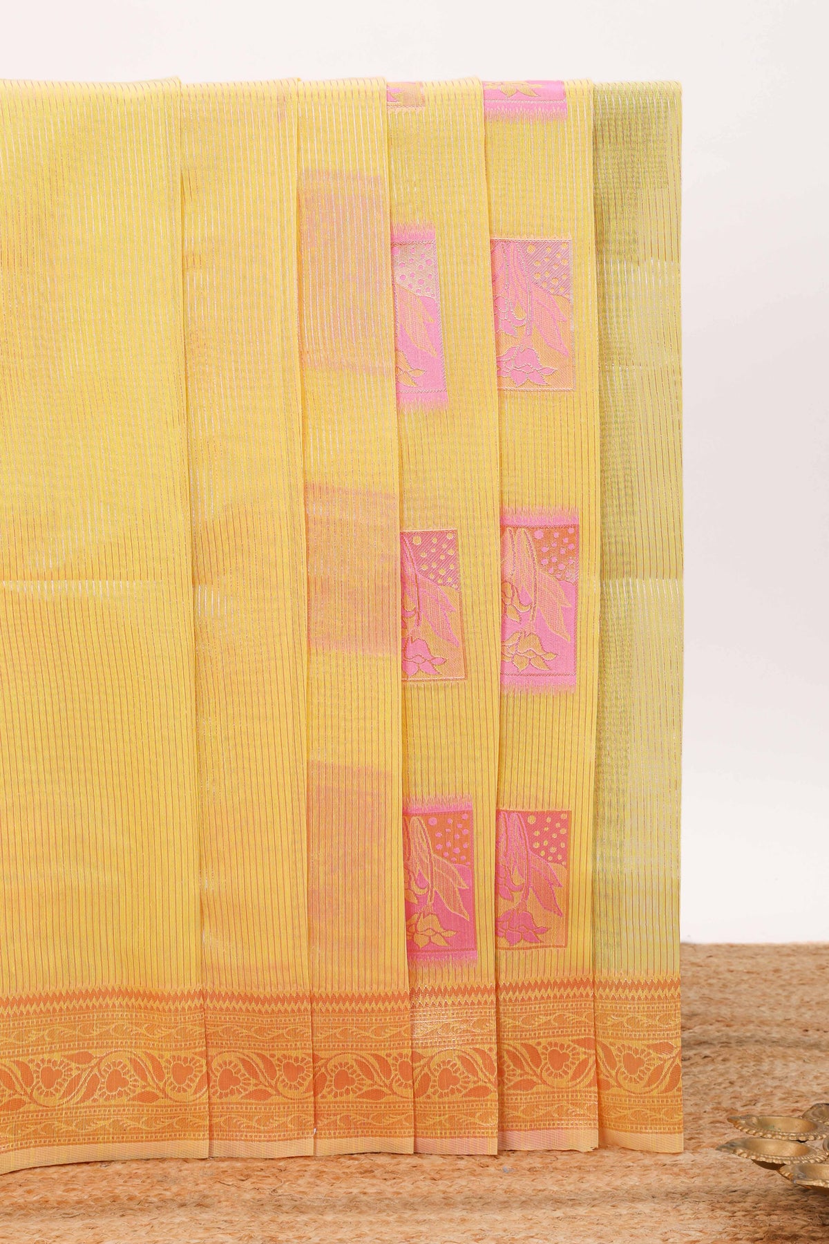 Yellow geometric motifs design kota cotton saree with self zari border and contrast blouse
