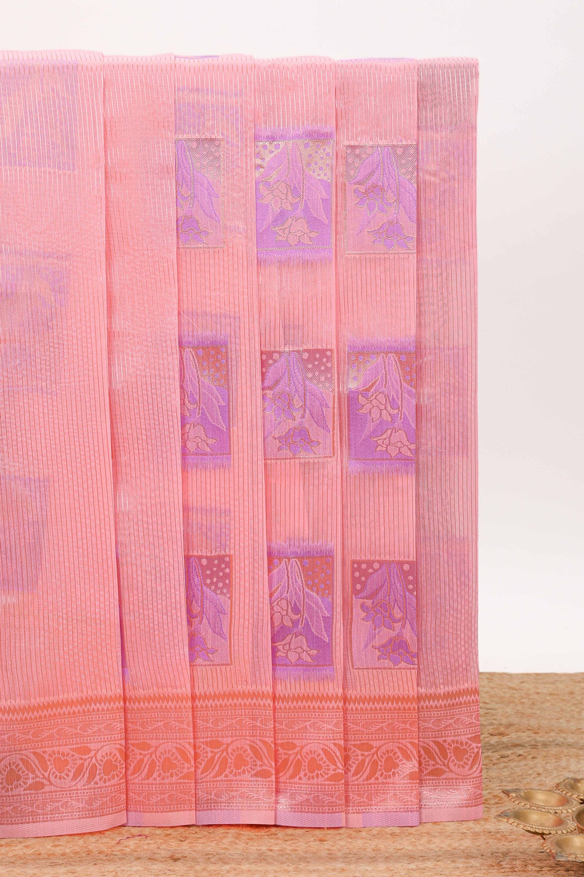 Pink geometric motifs design kota cotton saree with self zari border and contrast blouse