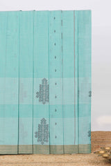 Light blue butta motif designs kovai cotton saree with contrast zari border and matching blouse