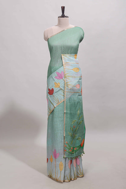 Green floral design linen cotton saree with self zari border and matching blouse