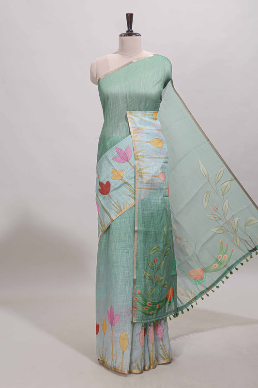 Green floral design linen cotton saree with self zari border and matching blouse