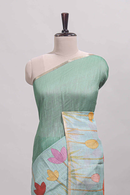 Green floral design linen cotton saree with self zari border and matching blouse