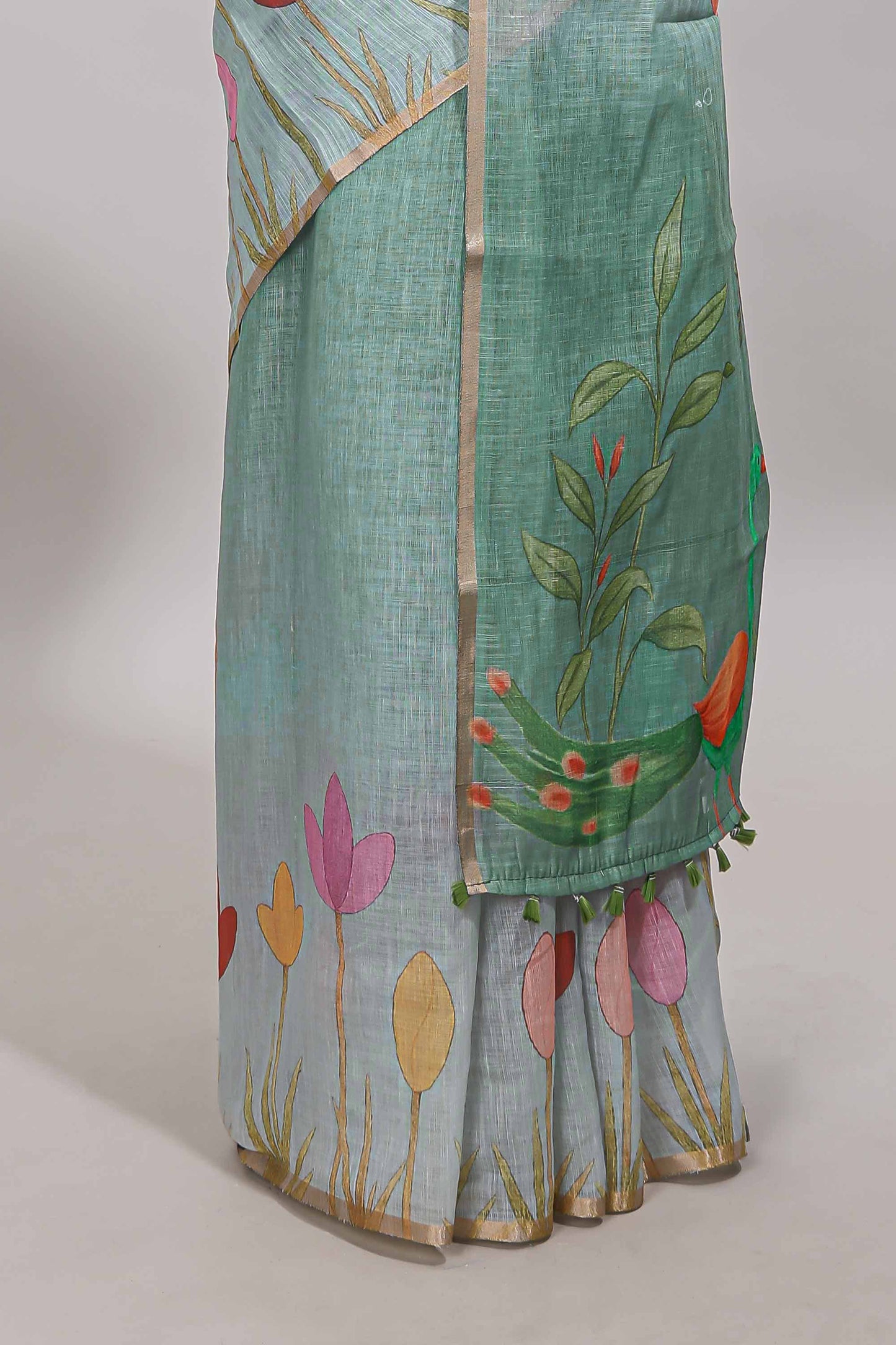 Green floral design linen cotton saree with self zari border and matching blouse
