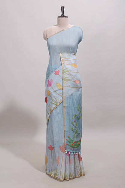 Blue floral design linen cotton saree with self zari border and matching blouse