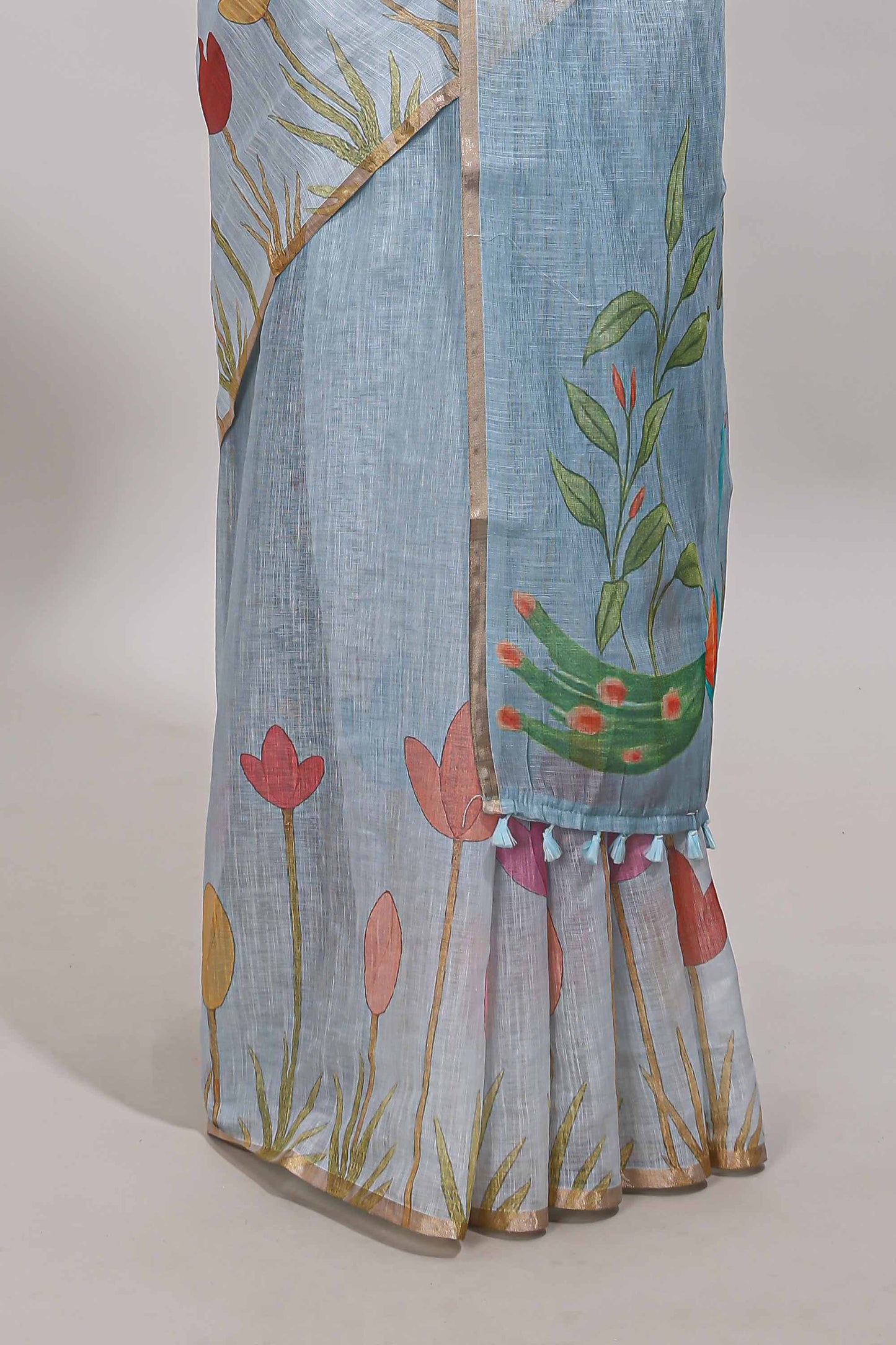 Blue floral design linen cotton saree with self zari border and matching blouse