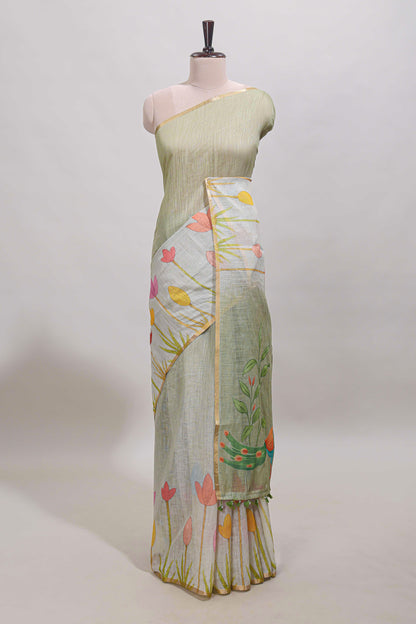 Light green floral design linen cotton saree with self zari border and matching blouse