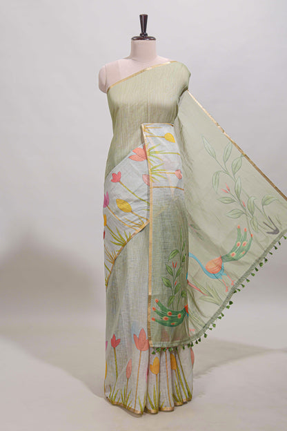 Light green floral design linen cotton saree with self zari border and matching blouse