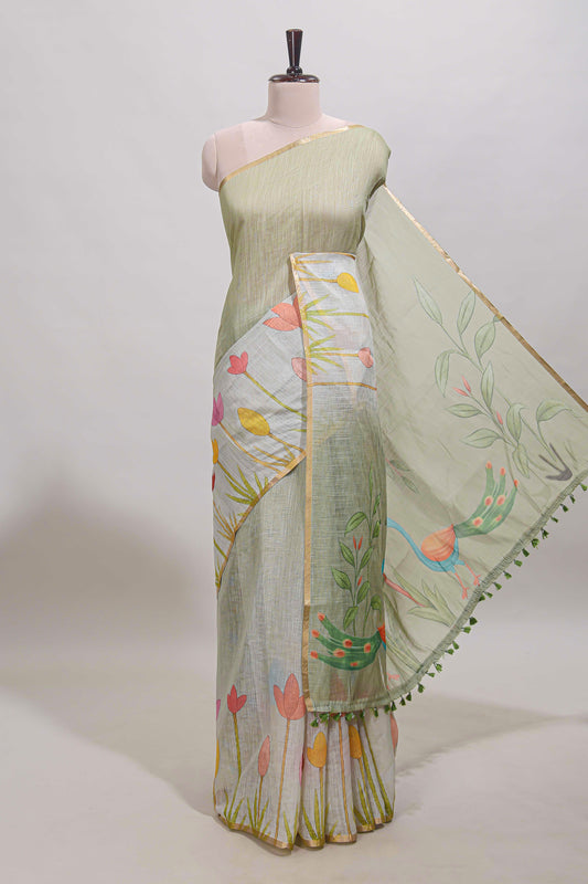 Light green floral design linen cotton saree with self zari border and matching blouse