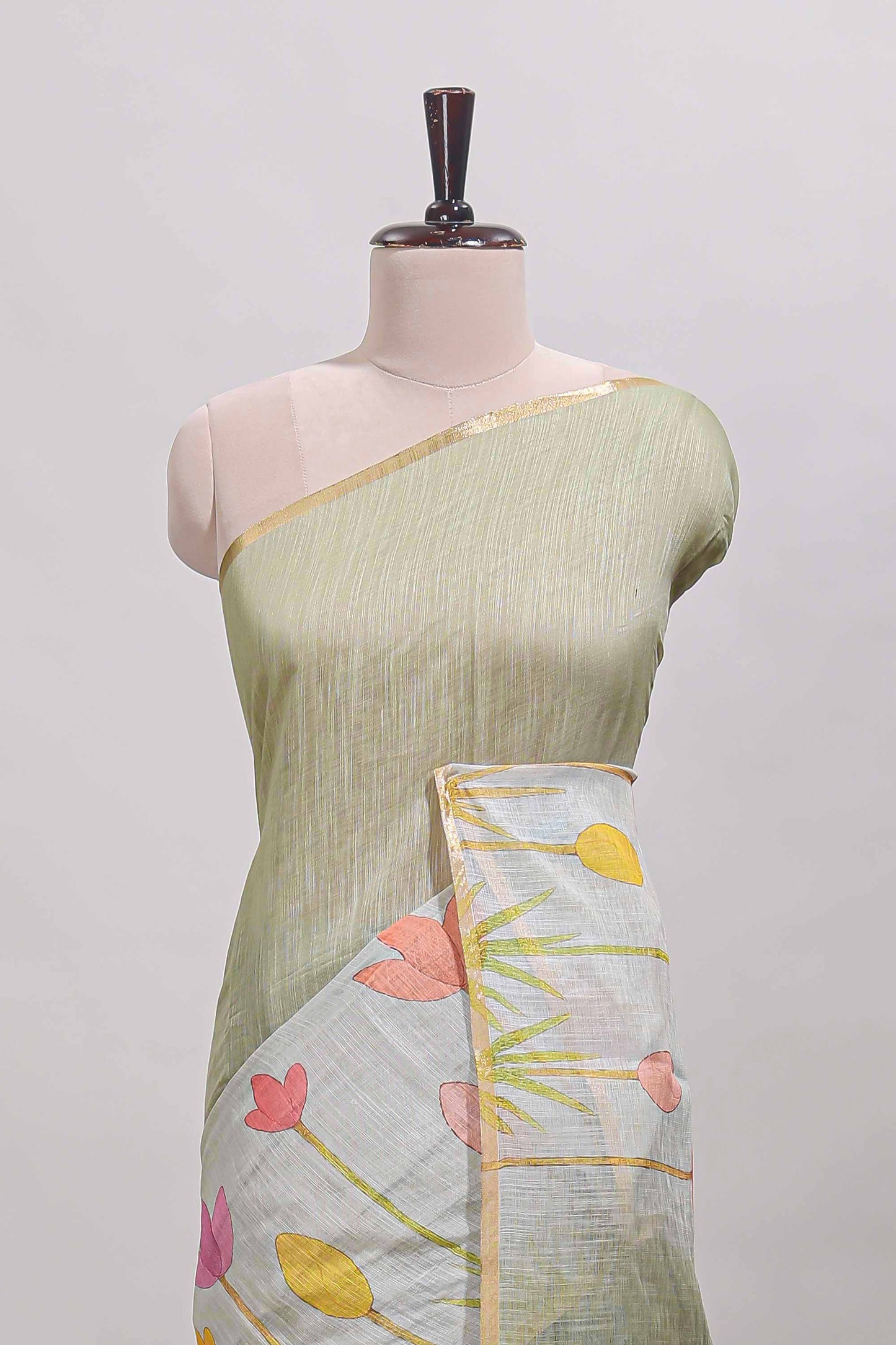 Light green floral design linen cotton saree with self zari border and matching blouse