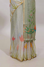 Light green floral design linen cotton saree with self zari border and matching blouse