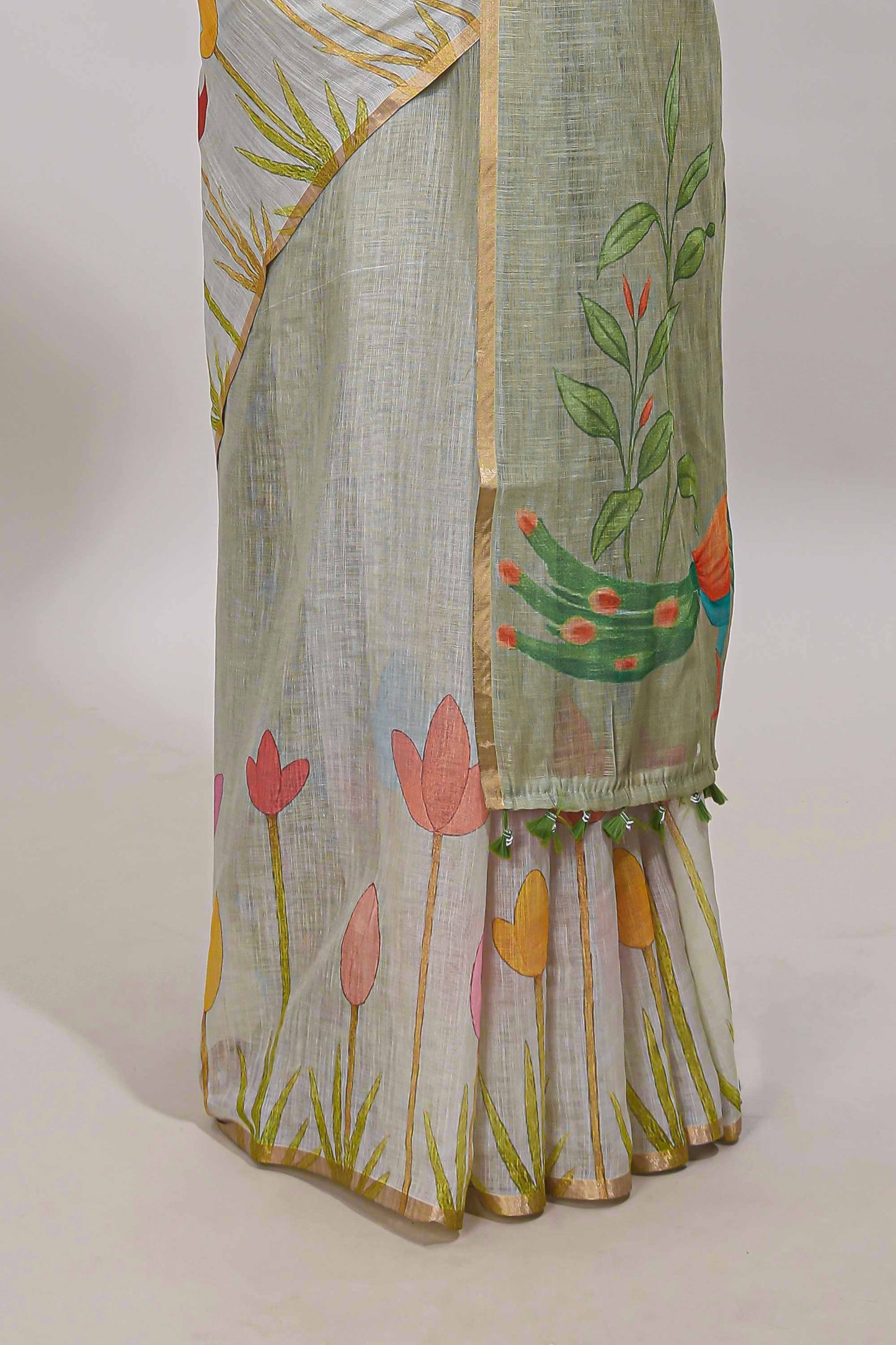 Light green floral design linen cotton saree with self zari border and matching blouse