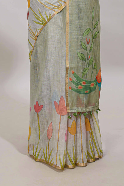 Light green floral design linen cotton saree with self zari border and matching blouse